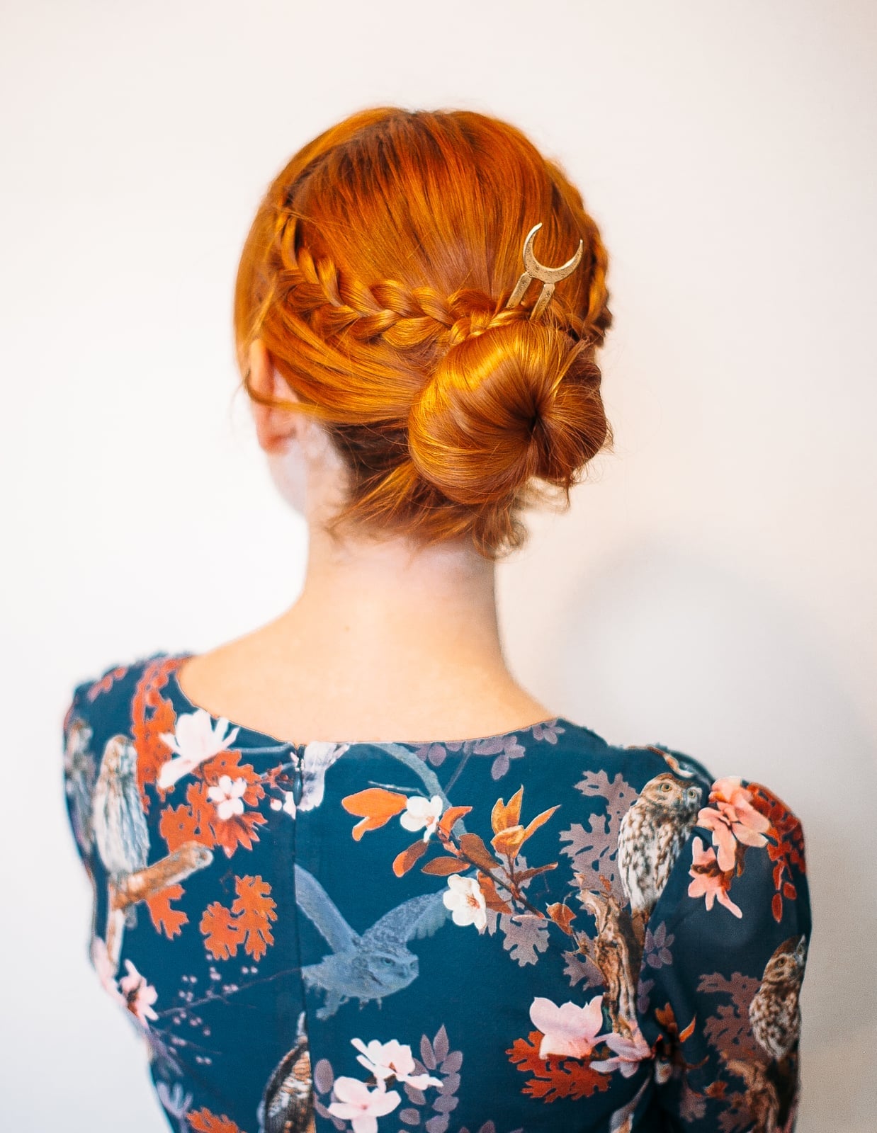 Vibrant Red Bun With Braided Accents Vibrant Red Bun With Braided Accents — Simple Bun Braids