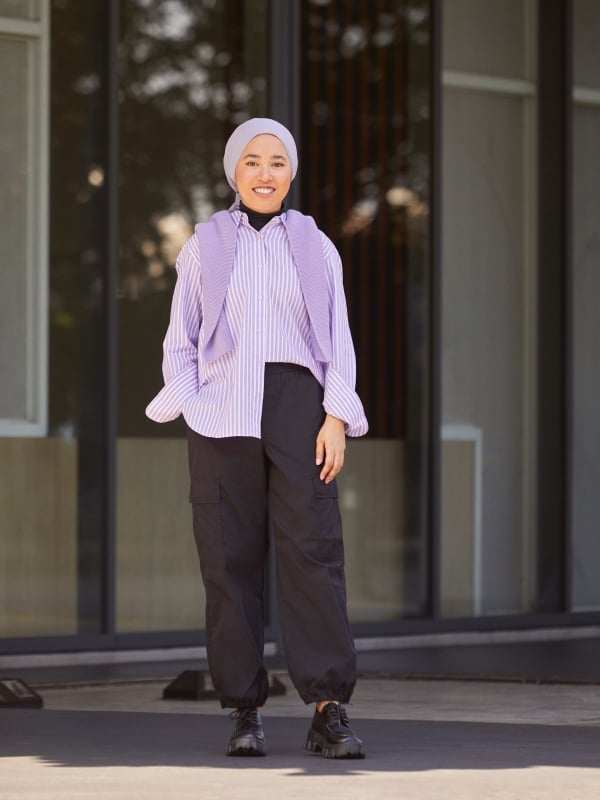 Black Cargo Pants With Striped Shirt And Purple Sweater — Simple Cargo Pants Outfits
