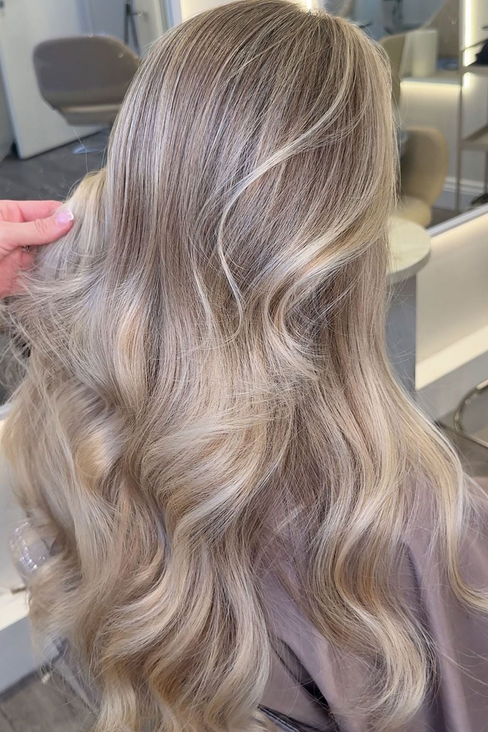 Chin Length Bob With Glossy Waves — Simple Champagne Blonde