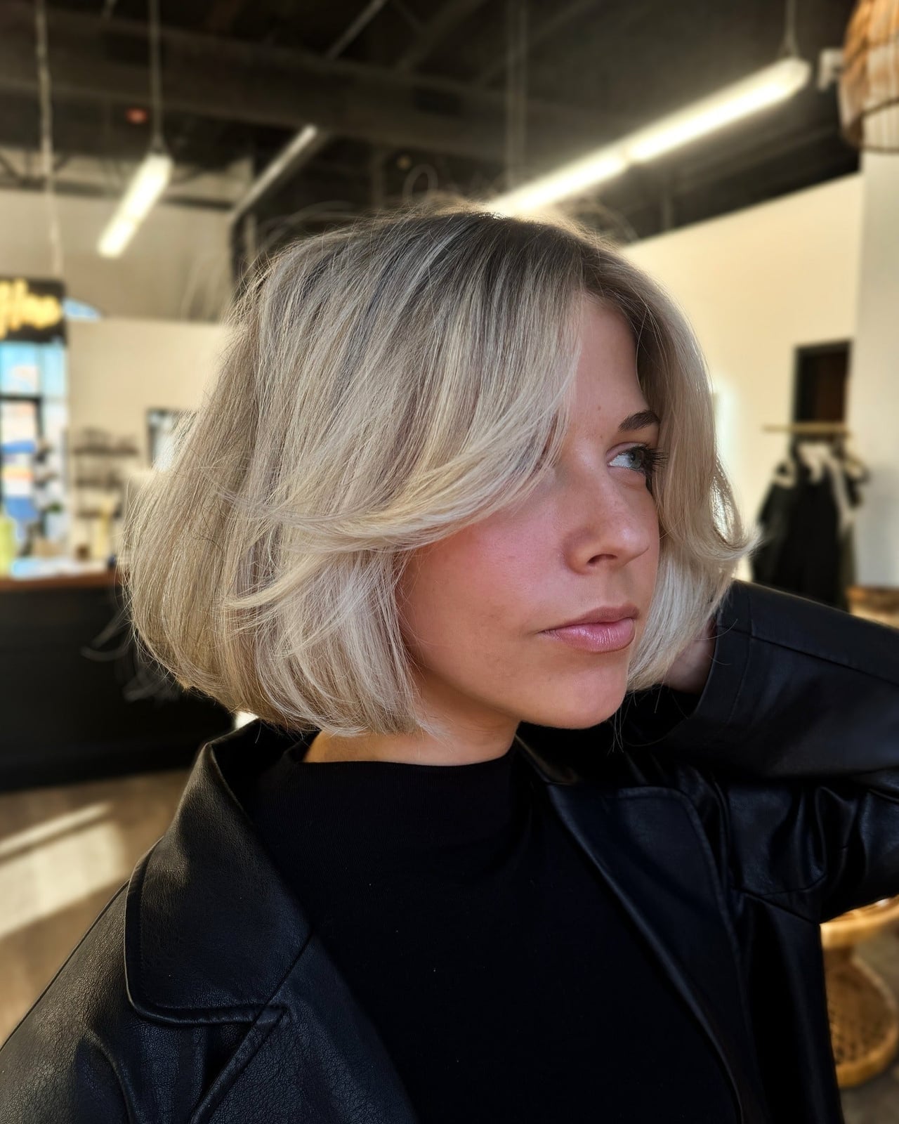 Platinum Blonde Bob With Face Framing Layers Platinum Blonde Bob With Face Framing Layers — Simple Chin Length Bob