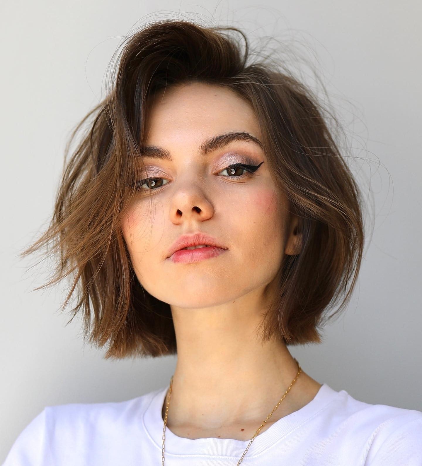 Medium Brown Wavy Bob With Lived-In Look Medium Brown Wavy Bob With Lived-In Look — Simple Chin Length Bob