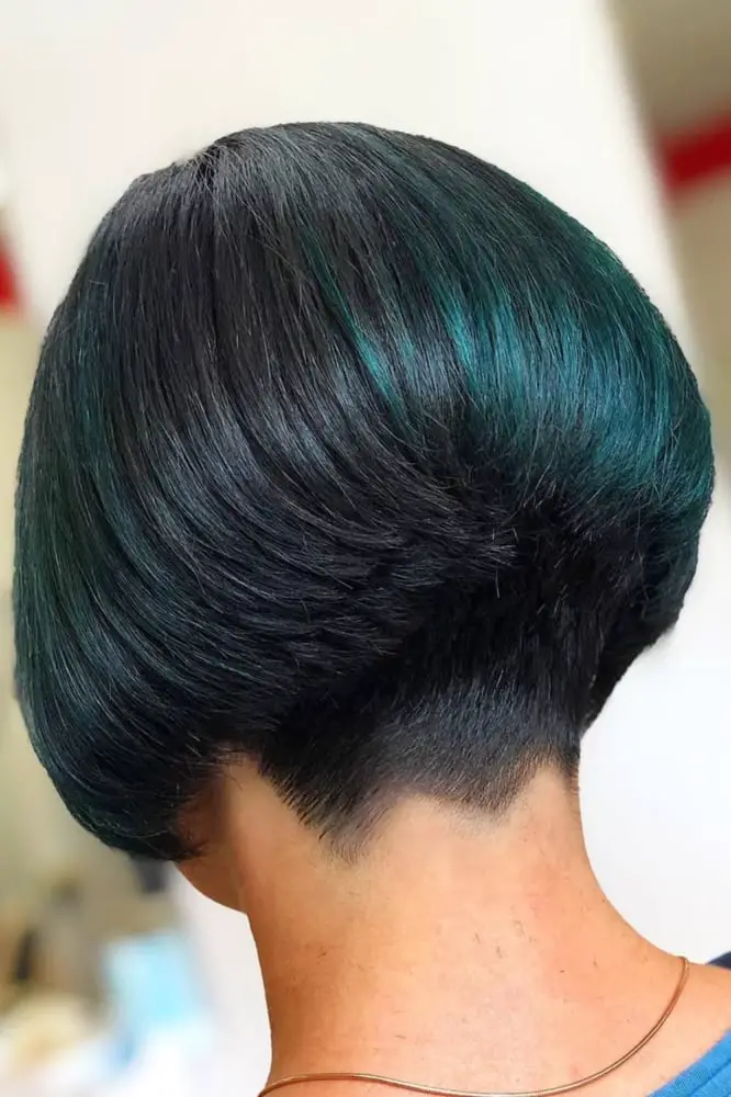 Stacked Black Bob With Teal Highlights Stacked Black Bob With Teal Highlights — Simple Chin Length Bob
