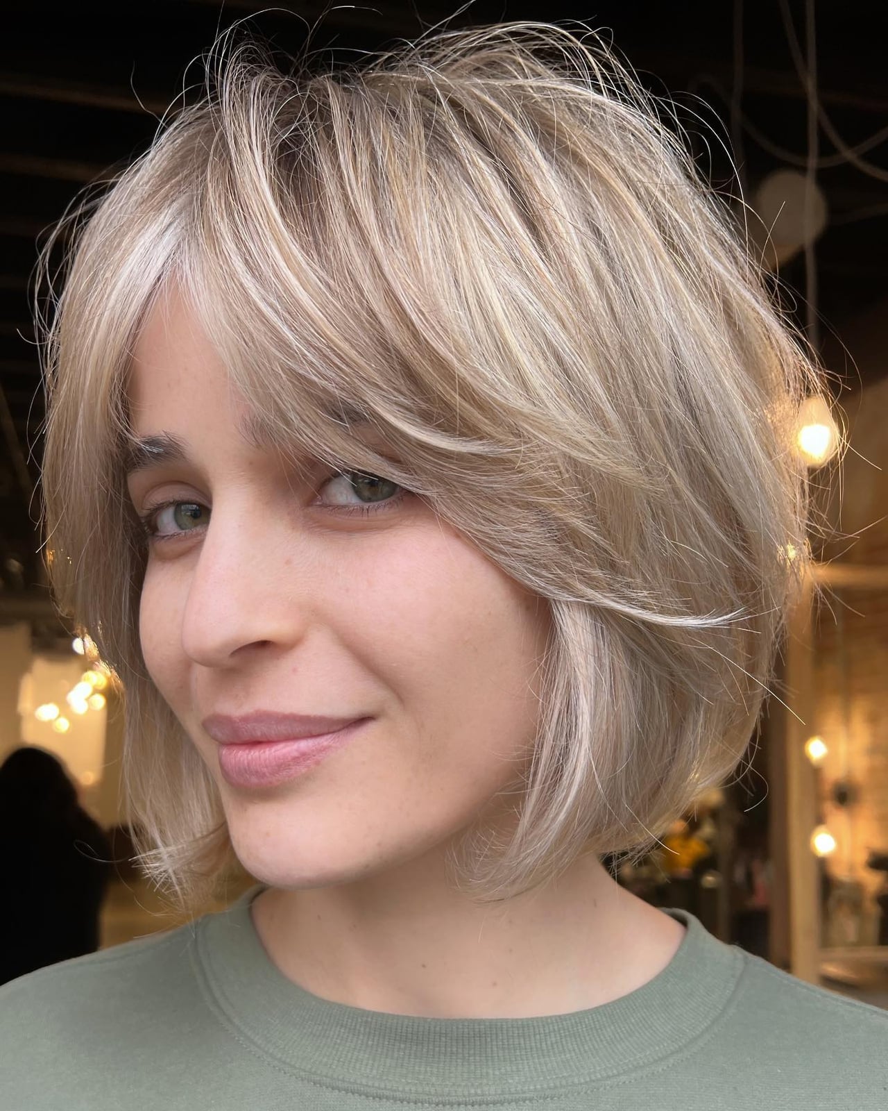 Ash Blonde Bob With Wispy Bangs and Waves Ash Blonde Bob With Wispy Bangs and Waves — Simple Chin Length Bob