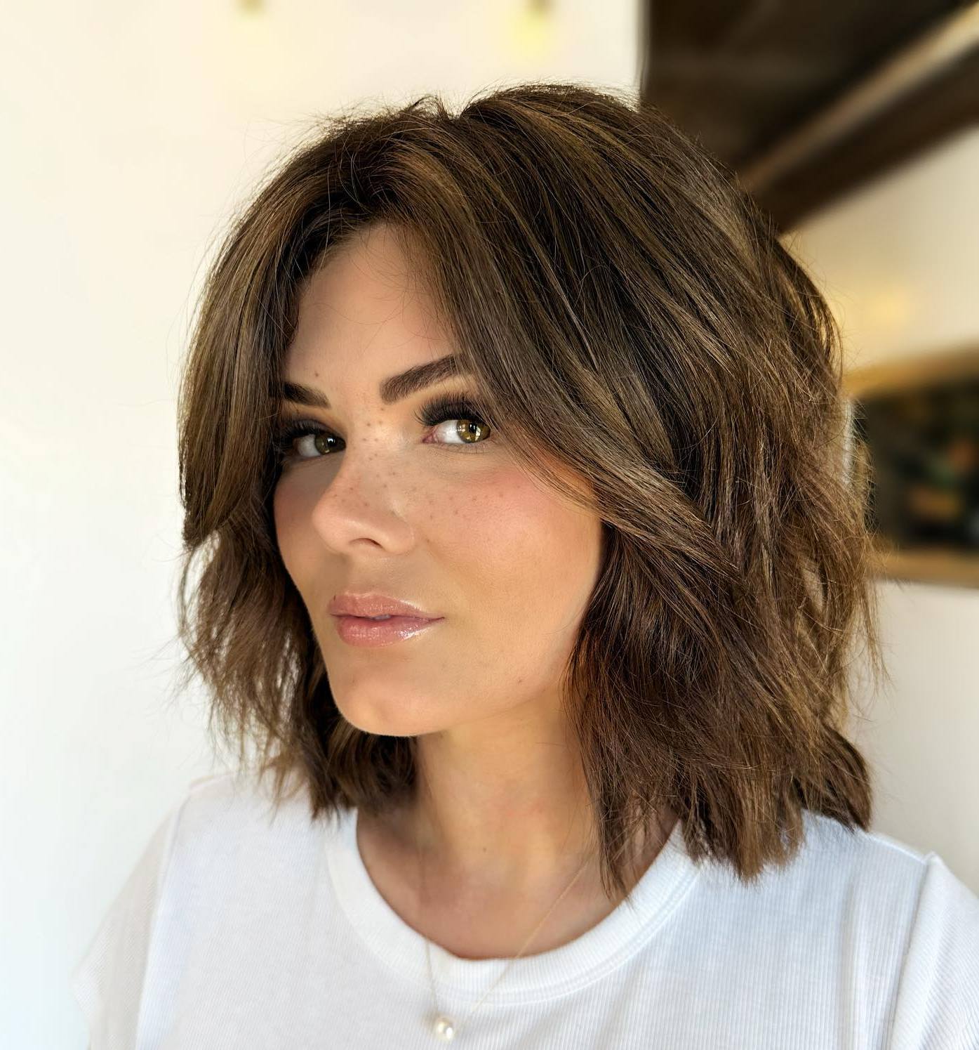 Chin Length Choppy Bob With Piecey Styling and Caramel Highlights Chin Length Choppy Bob With Piecey Styling and Caramel Highlights — Simple Choppy Bob Hairstyles