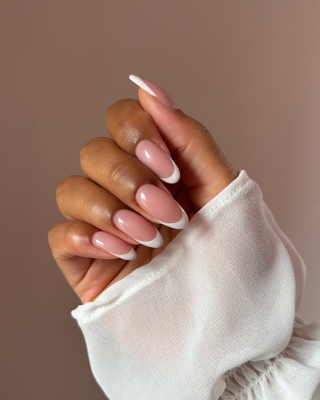 Medium Almond Nails With Perfectly Curved White Tips Medium Almond Nails With Perfectly Curved White Tips — Simple Chrome French Tip Nails