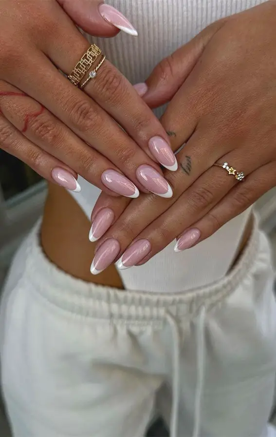 Medium Almond Nails With Glossy White Tips, Everyday Version Medium Almond Nails With Glossy White Tips, Everyday Version — Simple Chrome French Tip Nails