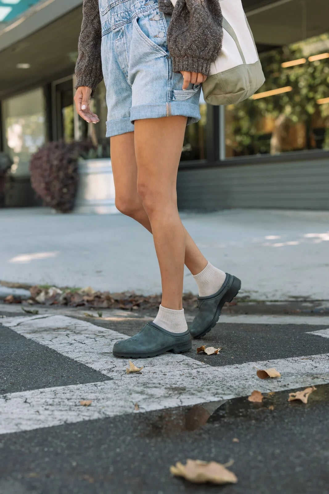 Dark Gray Clogs with Denim Overalls and Gray Knit, Close-Up Take Dark Gray Clogs with Denim Overalls and Gray Knit, Close-Up Take — Simple Clogs Outfits