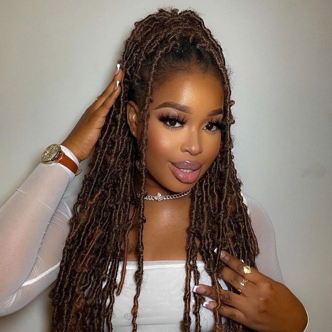 Mid-Back Faux Locs High Ponytail With Blonde Highlights — Simple Color Locs