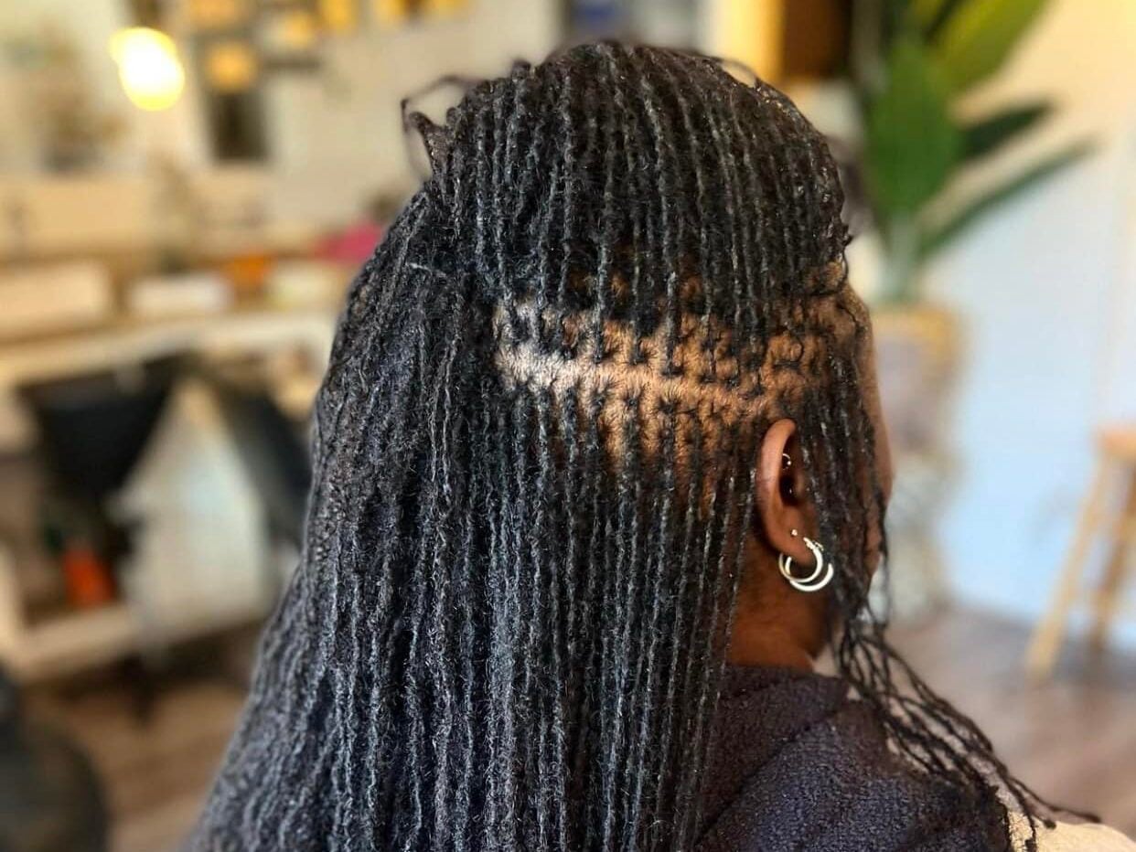 Mid-Back Coily Locs With Lighter Brown Highlights — Simple Color Locs