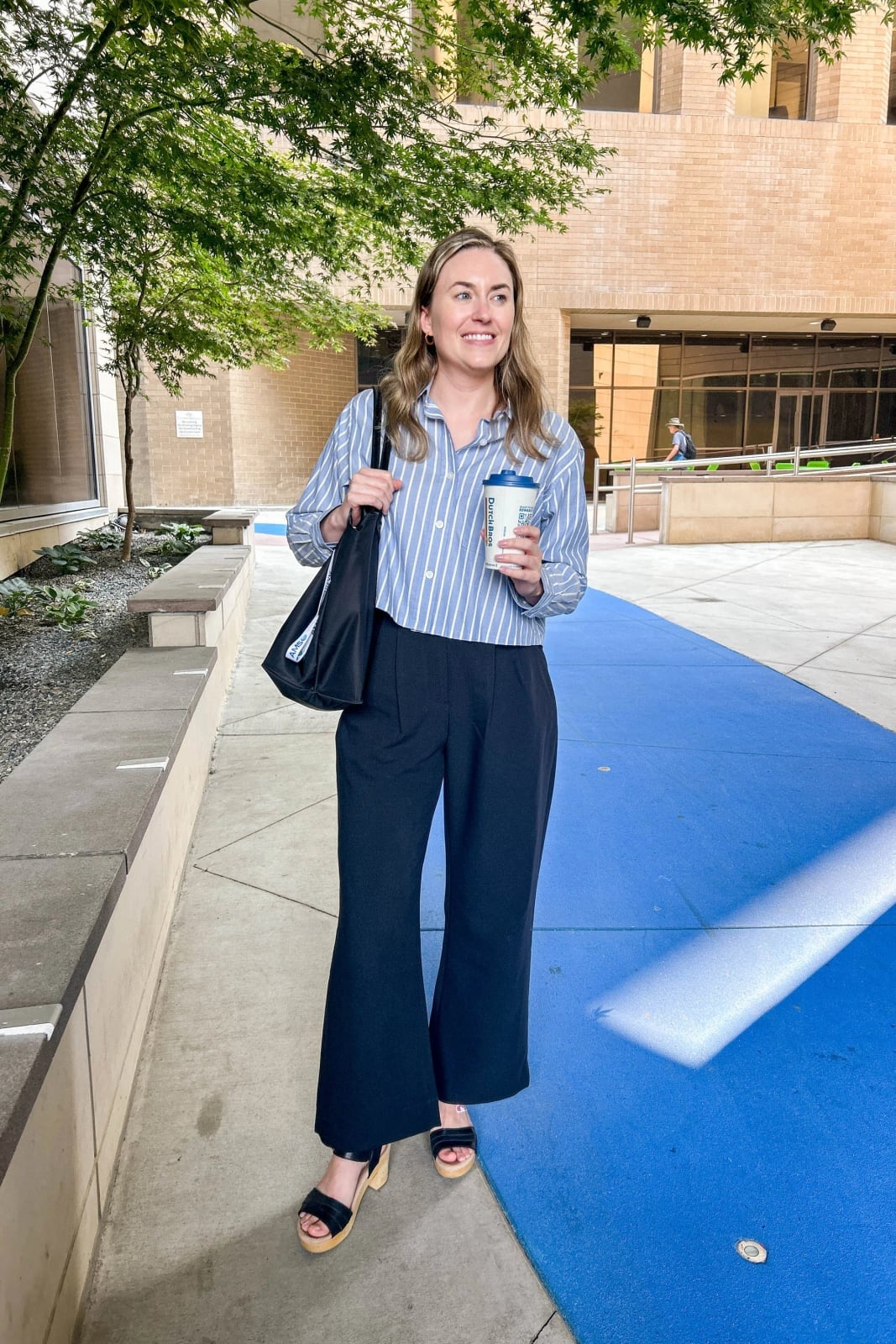 Striped Button-Down and Black Wide-Leg Trousers Striped Button-Down and Black Wide-Leg Trousers — Simple Conference Outfits