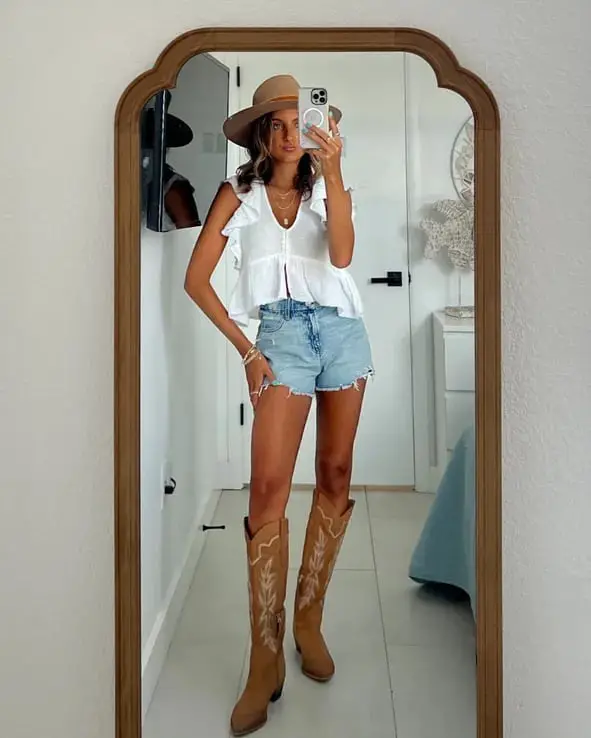 Ruffled Peplum Top with Denim Shorts and Fedora and Tan Cowboy Boots Ruffled Peplum Top with Denim Shorts and Fedora and Tan Cowboy Boots — Simple Country Concert Outfits Ideas