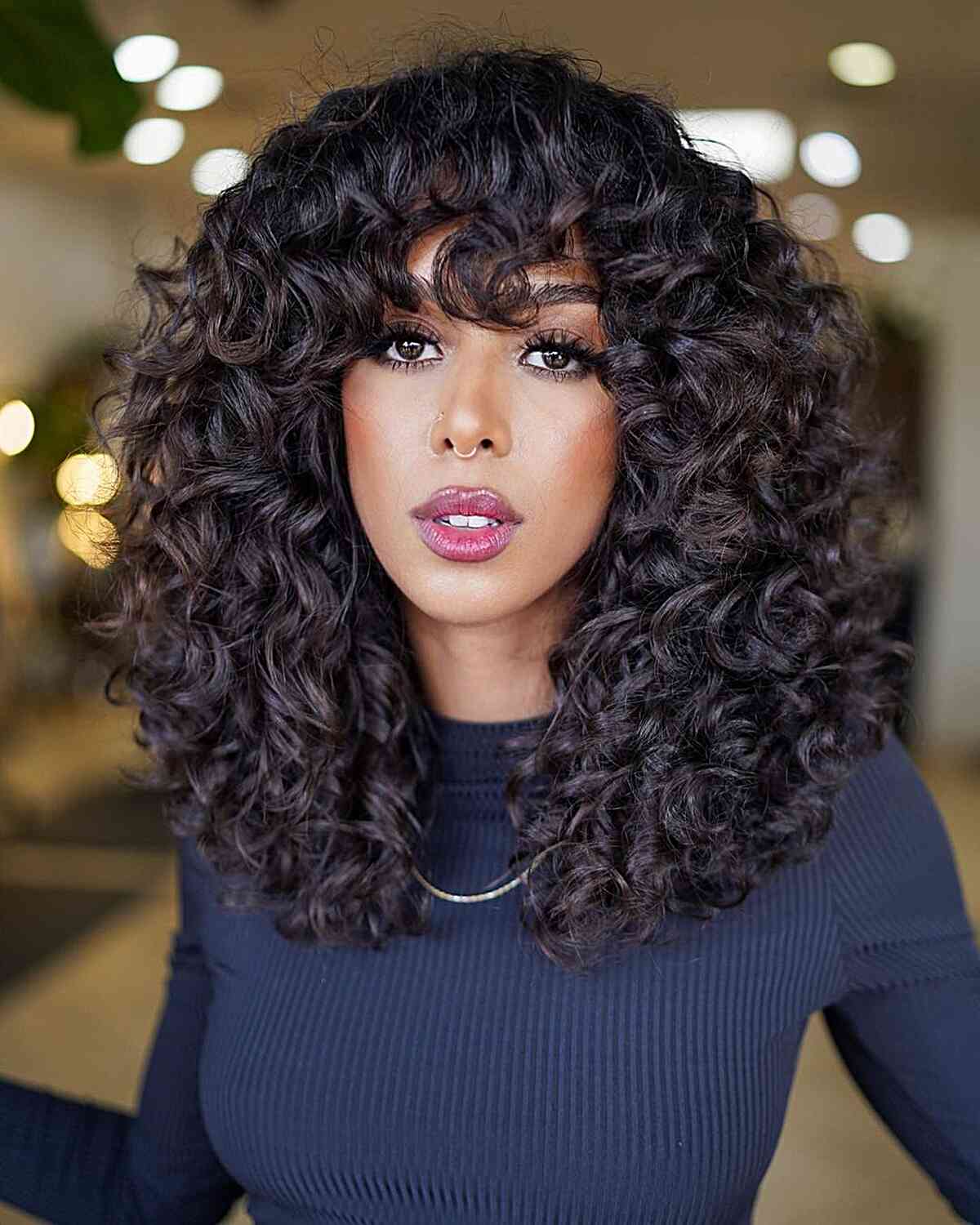 Collarbone Length Layers With Curtain Bangs Collarbone Length Layers With Curtain Bangs — Simple Curly Bangs