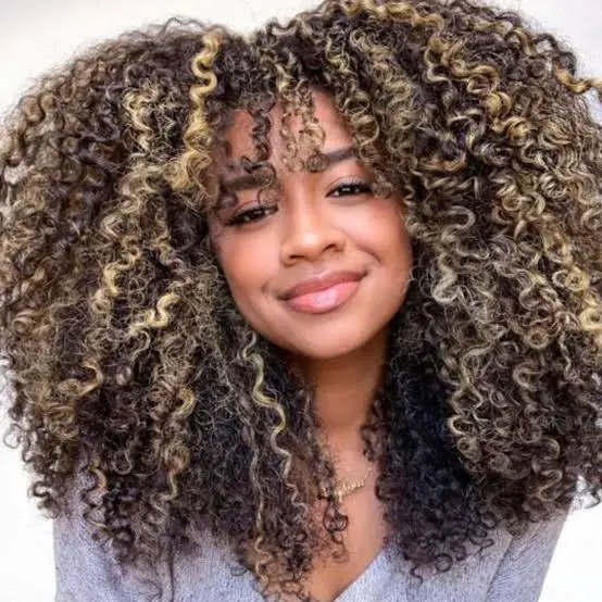 Mid-Back Layers With Blonde Highlights Mid-Back Layers With Blonde Highlights — Simple Curly Bangs