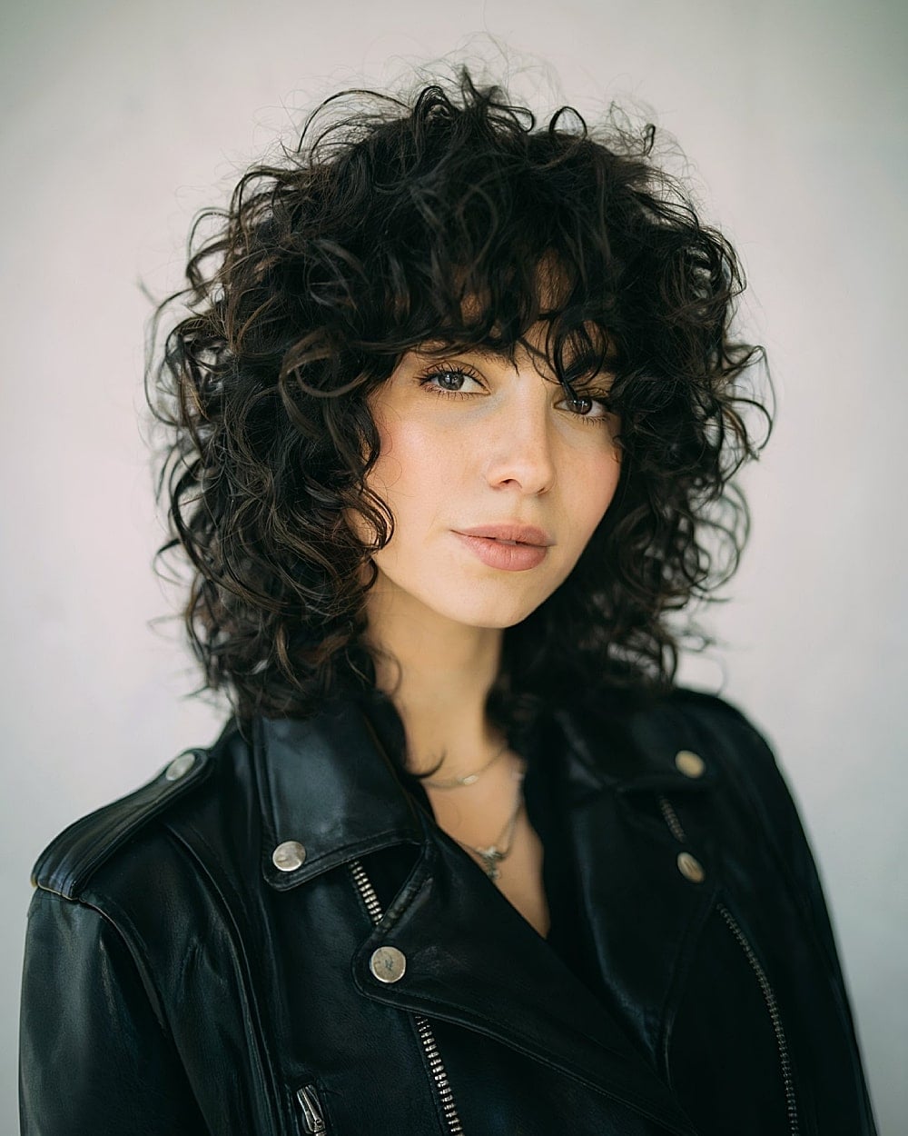 Collarbone Shag With Textured Layers Collarbone Shag With Textured Layers — Simple Curly Bangs
