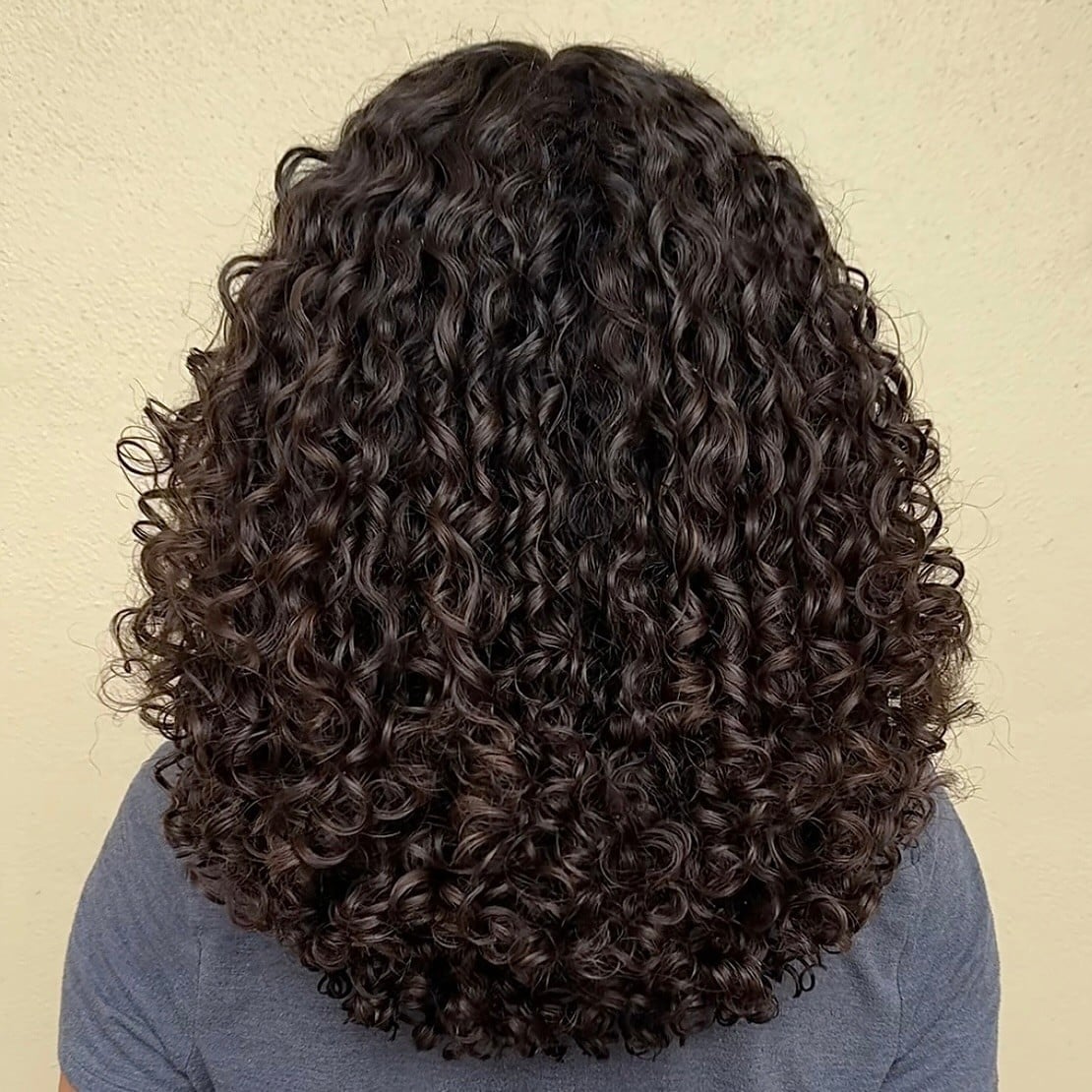 Mid-Back Layers With Defined Ringlets Mid-Back Layers With Defined Ringlets — Simple Curly Hair Cuts