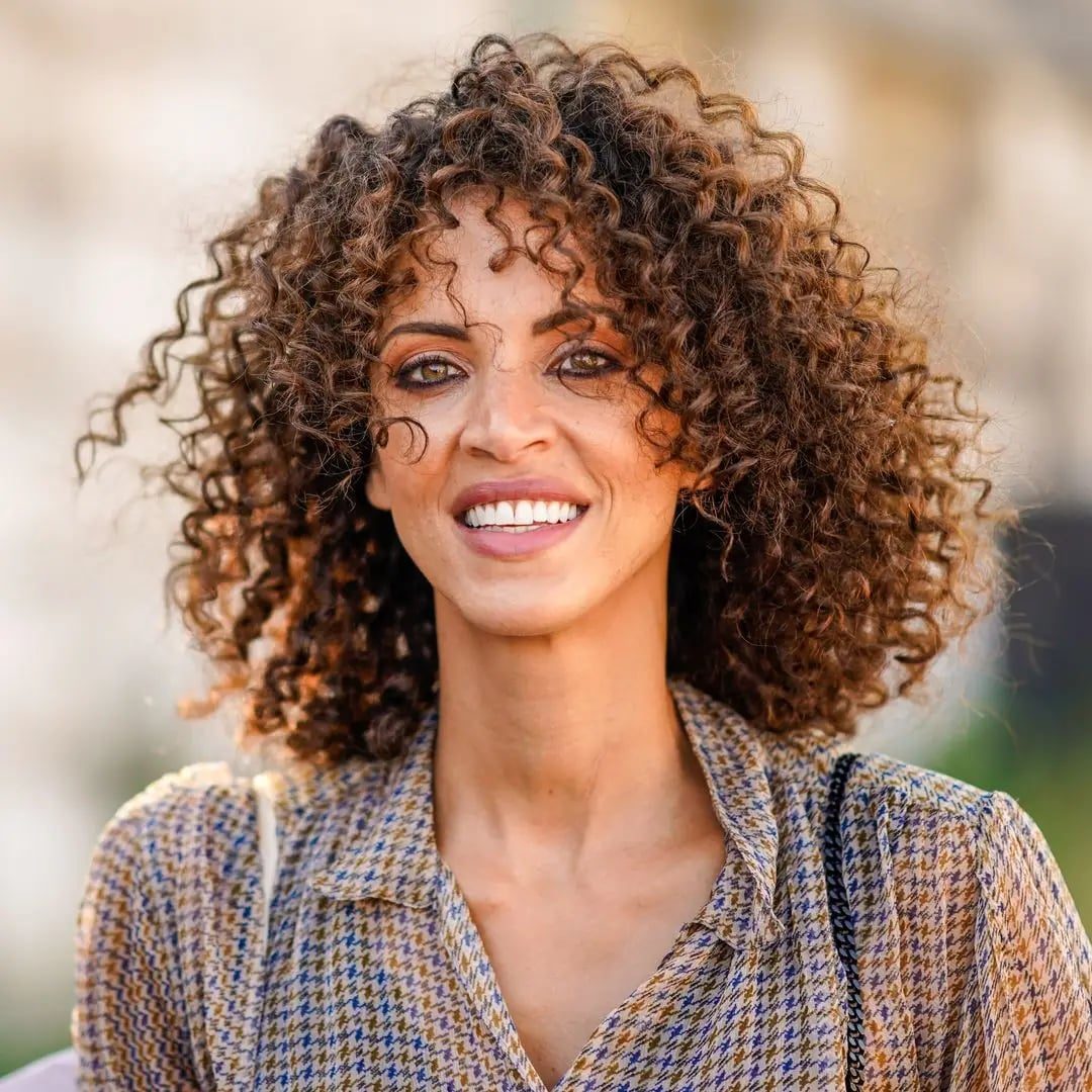 Shoulder Length Shag With Wispy Bangs Shoulder Length Shag With Wispy Bangs — Simple Curly Hair Layers