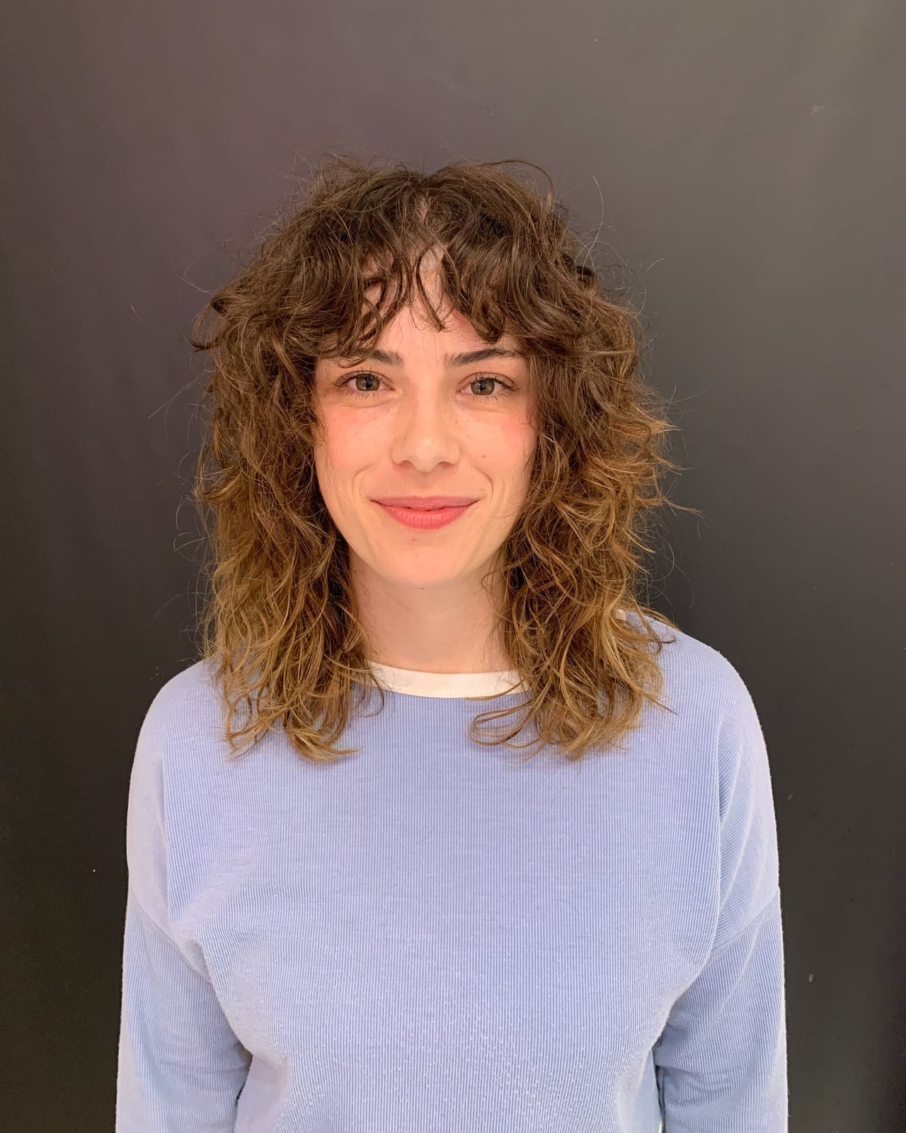 Shoulder Length Shag With Textured Layers — Simple Curly Shag