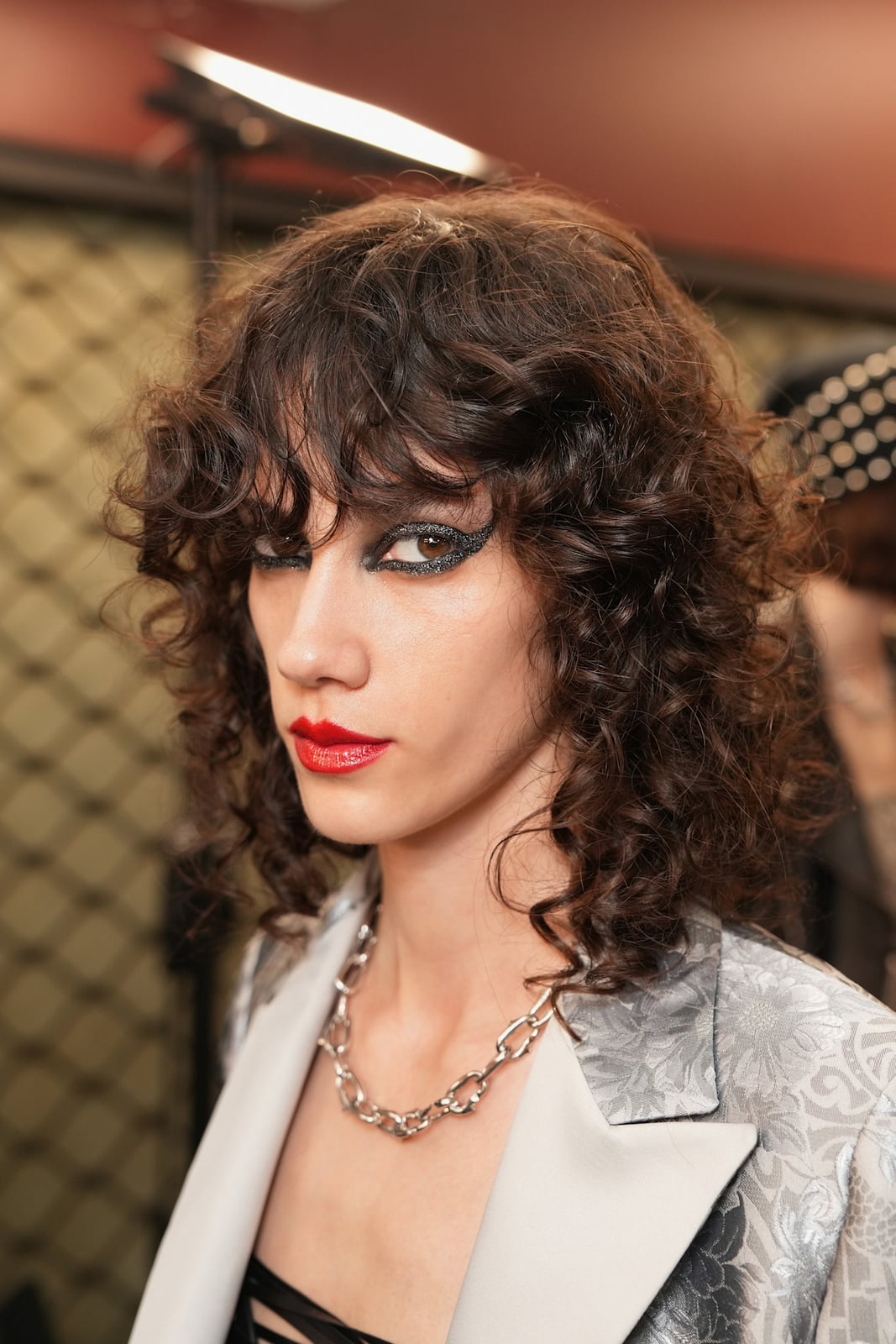 Shoulder Length Dark Brown Shag With Curtain Bangs, Close-Up Take — Simple Curly Shag