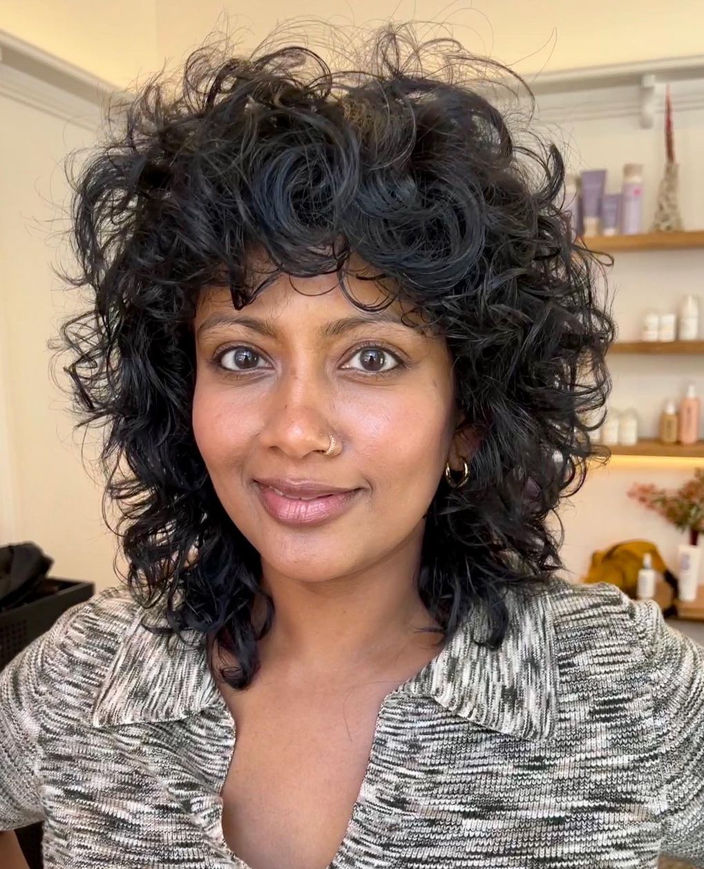 Collarbone Black Shag With Shaggy Bangs — Simple Curly Shag Haircut