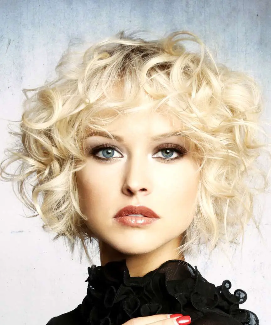 Collarbone Ash Blonde Shag With Voluminous Curls — Simple Curly Shag Haircut