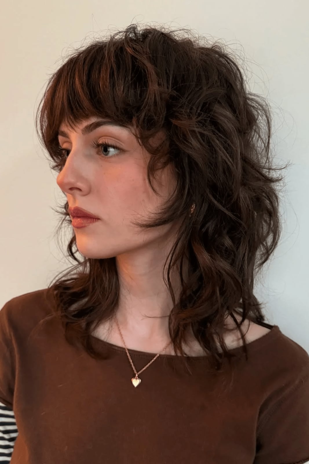 Collarbone Shag With Short Choppy Bangs — Simple Curly Shag Haircut
