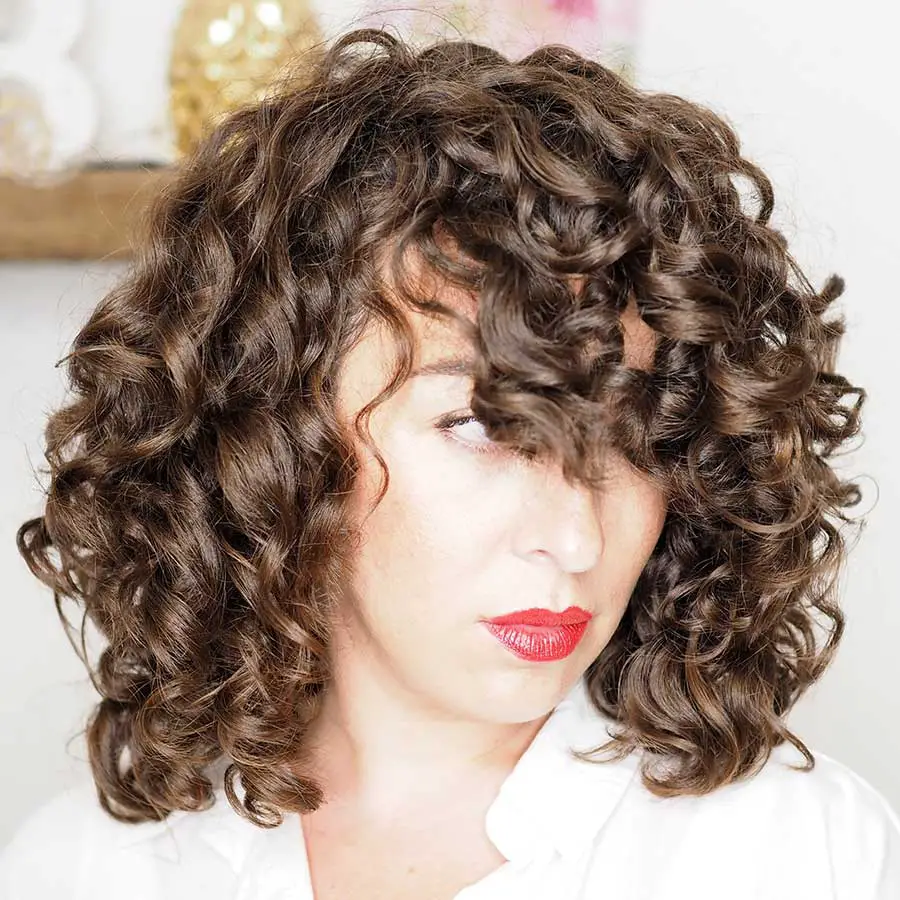 Shoulder Medium Brown Wolf Cut With Warm Highlights Shoulder Medium Brown Wolf Cut With Warm Highlights — Simple Curly Wolf Cut