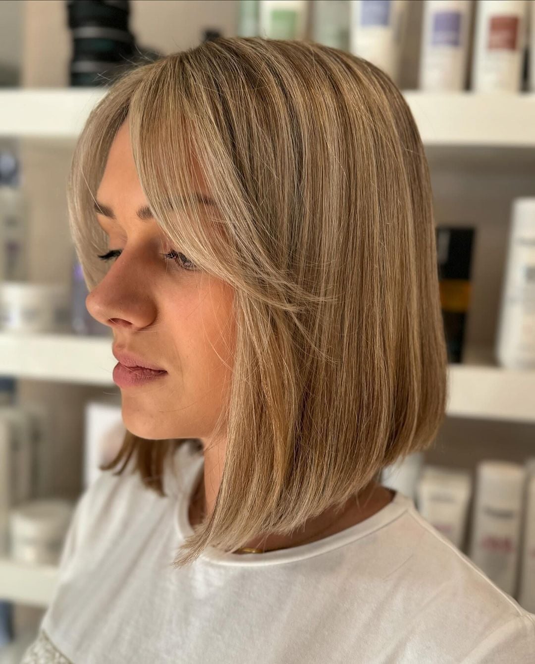 Chin Length Blonde Bob With Sharp Line Chin Length Blonde Bob With Sharp Line — Simple Curtain Bangs Short