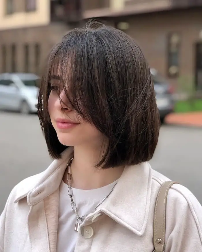 Chin Length Bob With Air Dried Texture Chin Length Bob With Air Dried Texture — Simple Curtain Bangs Short