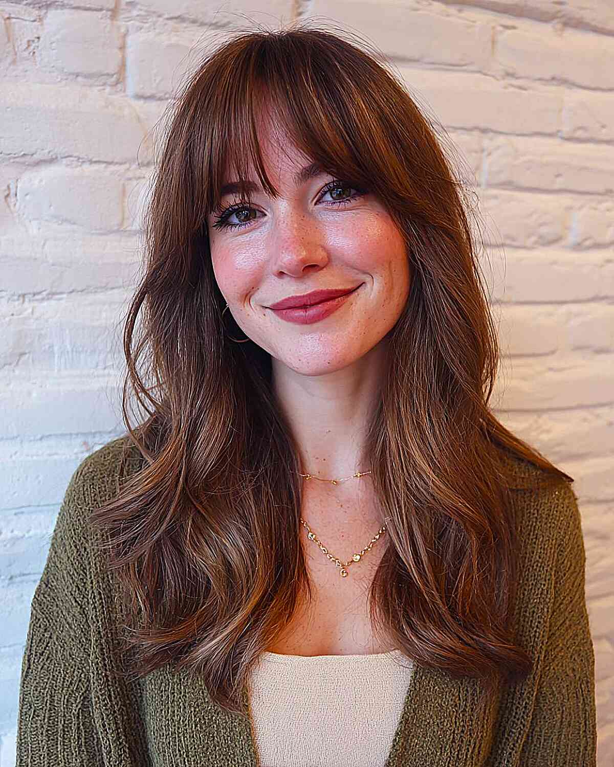 Mid-Back Wavy Hair With Wispy Bangs — Simple Cut Bangs