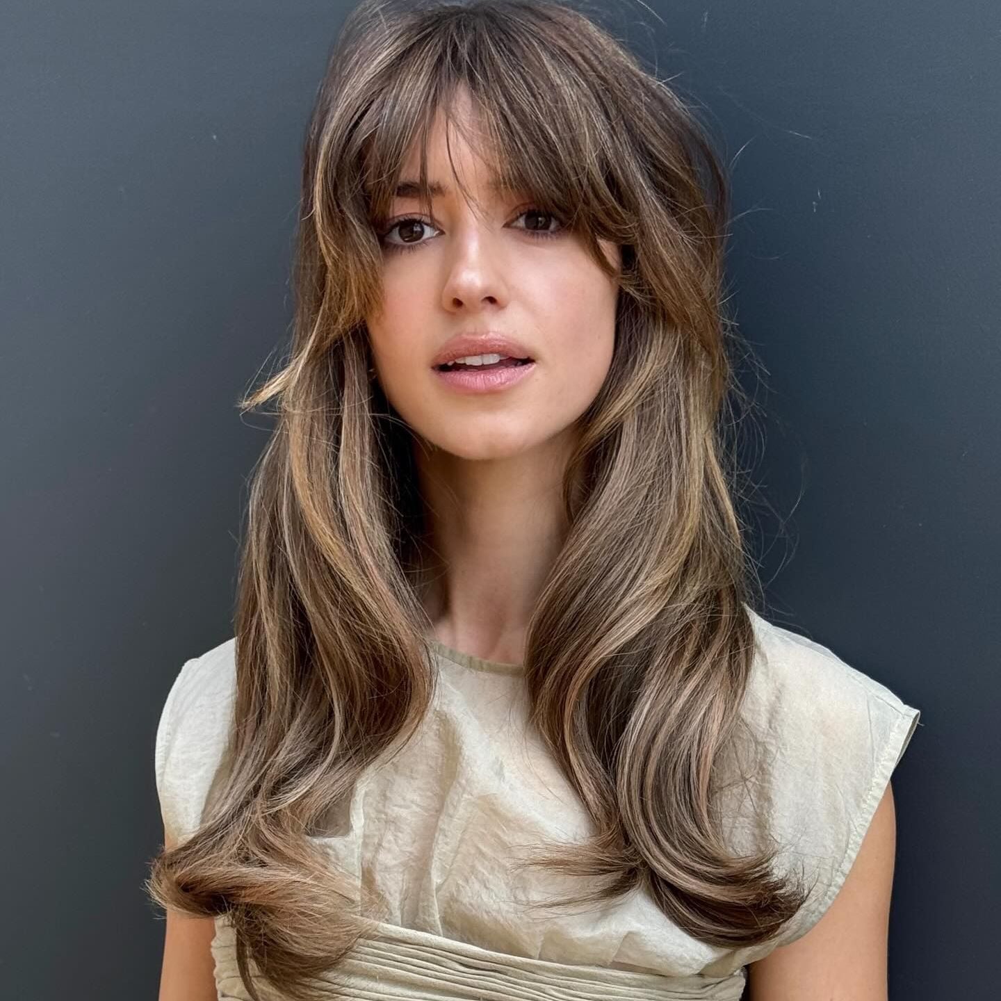 Long Wavy Thick Hair With Voluminous Curtain Bangs — Simple Cut Bangs