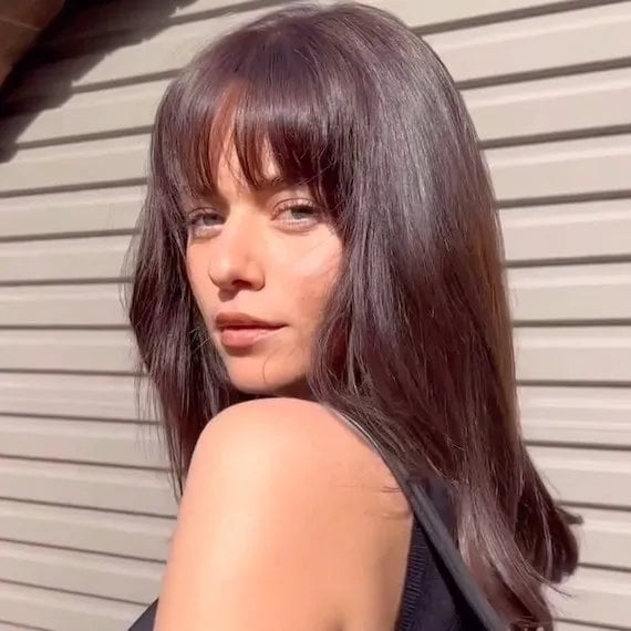 Mid-Back Wavy Dark Brown With Wispy Bangs and Long Layers — Simple Cut Bangs