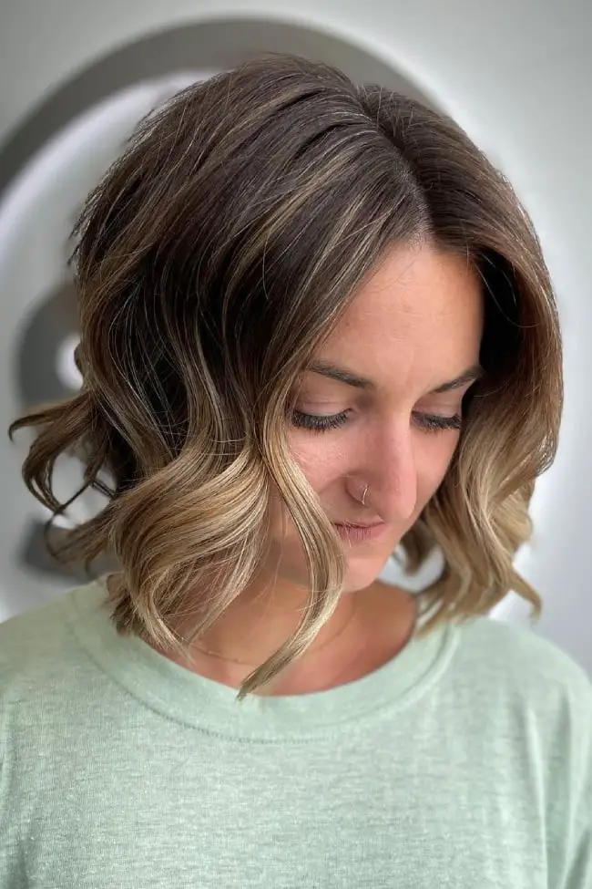 Dark Brown Bob With Subtle Lighter Highlights and Wavy Blowout Dark Brown Bob With Subtle Lighter Highlights and Wavy Blowout — Simple Dark Highlights