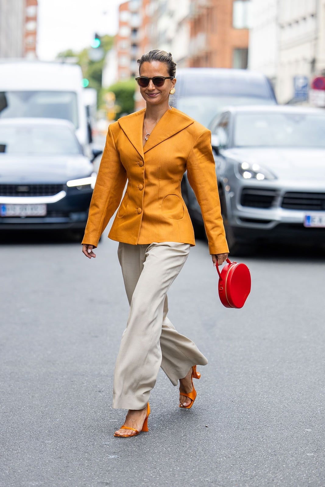 Mustard Blazer with Cream Trousers for Dinner and Red Circular Handbag — Simple Dinner Outfits Night