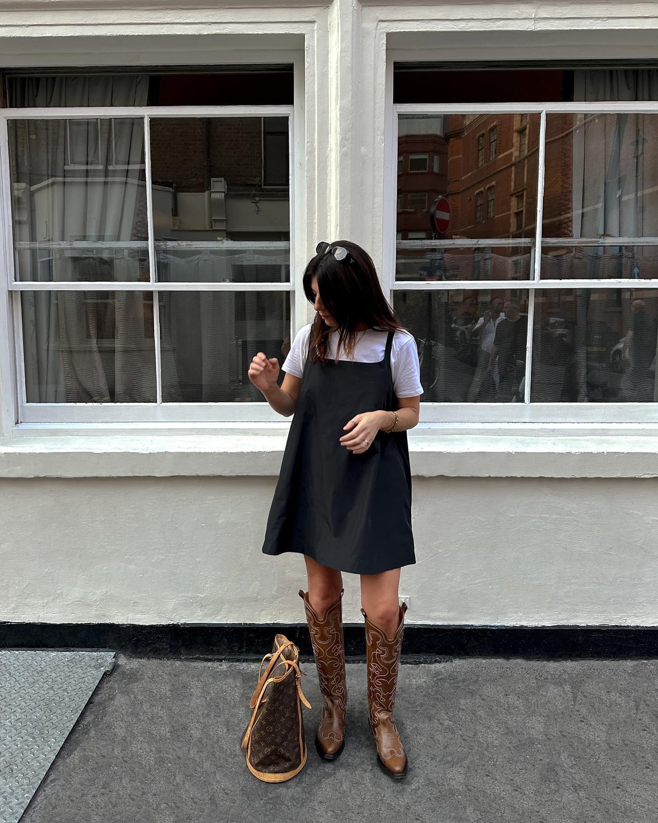 Black Pinafore Dress With White T Shirt and Brown Cowboy Boots Black Pinafore Dress With White T Shirt and Brown Cowboy Boots — Simple Dress and Boots