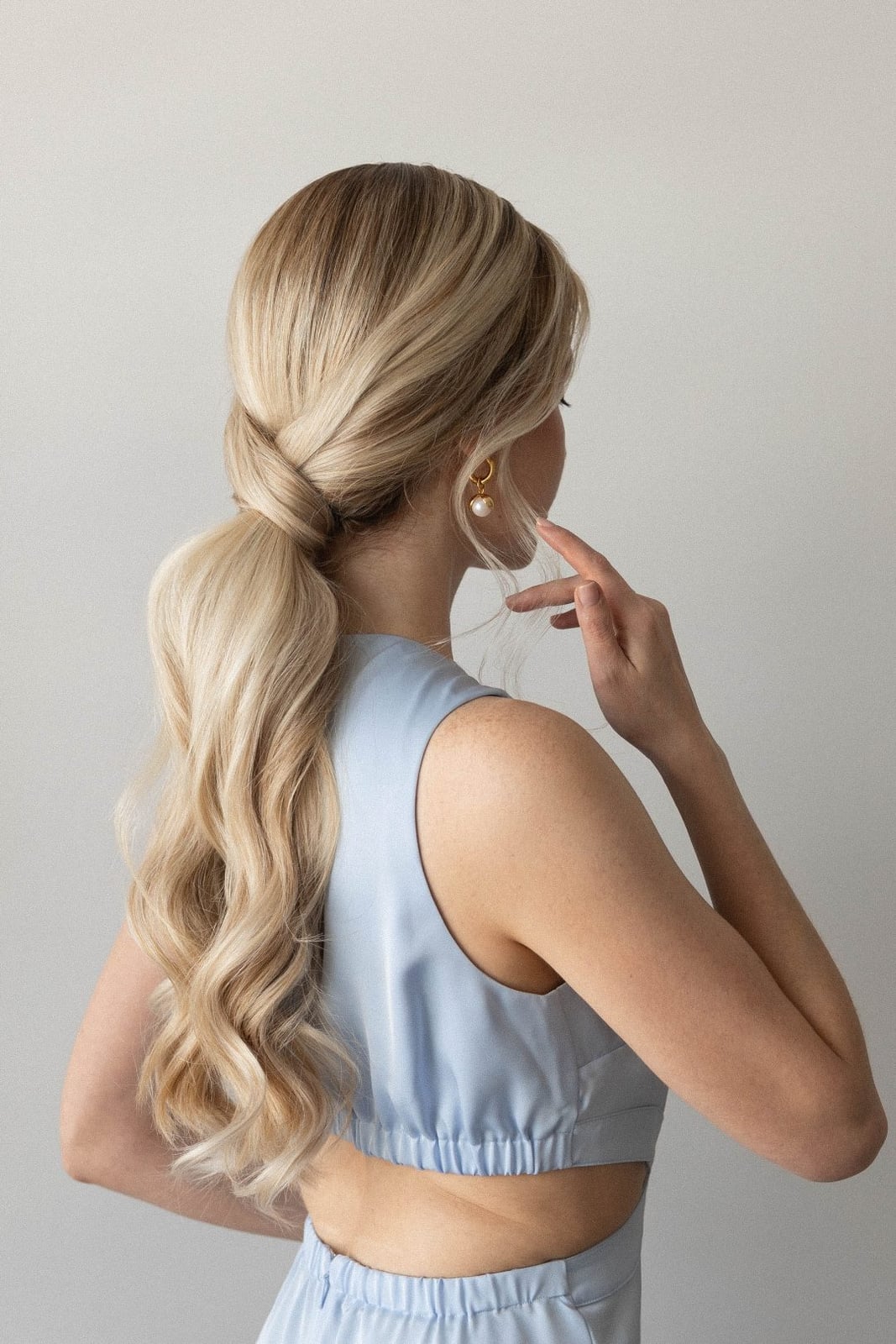 Ash Blonde Sleek High Ponytail With Twisted Wrap Ash Blonde Sleek High Ponytail With Twisted Wrap — Simple Extensions Hairstyles
