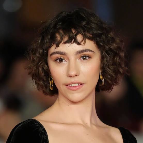 Curly Chin Bob With Curtain Bangs — Simple French Bob