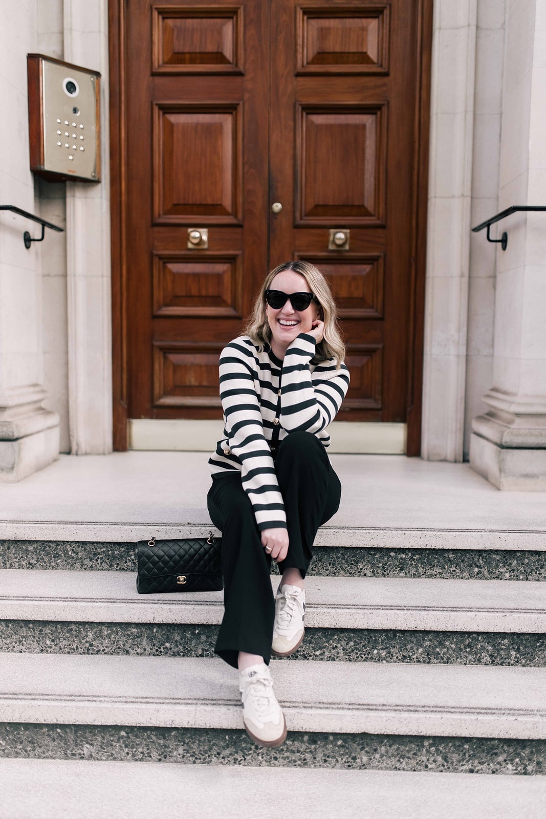 Striped Knit Sweater with Black Trousers — Simple Game Day Outfits