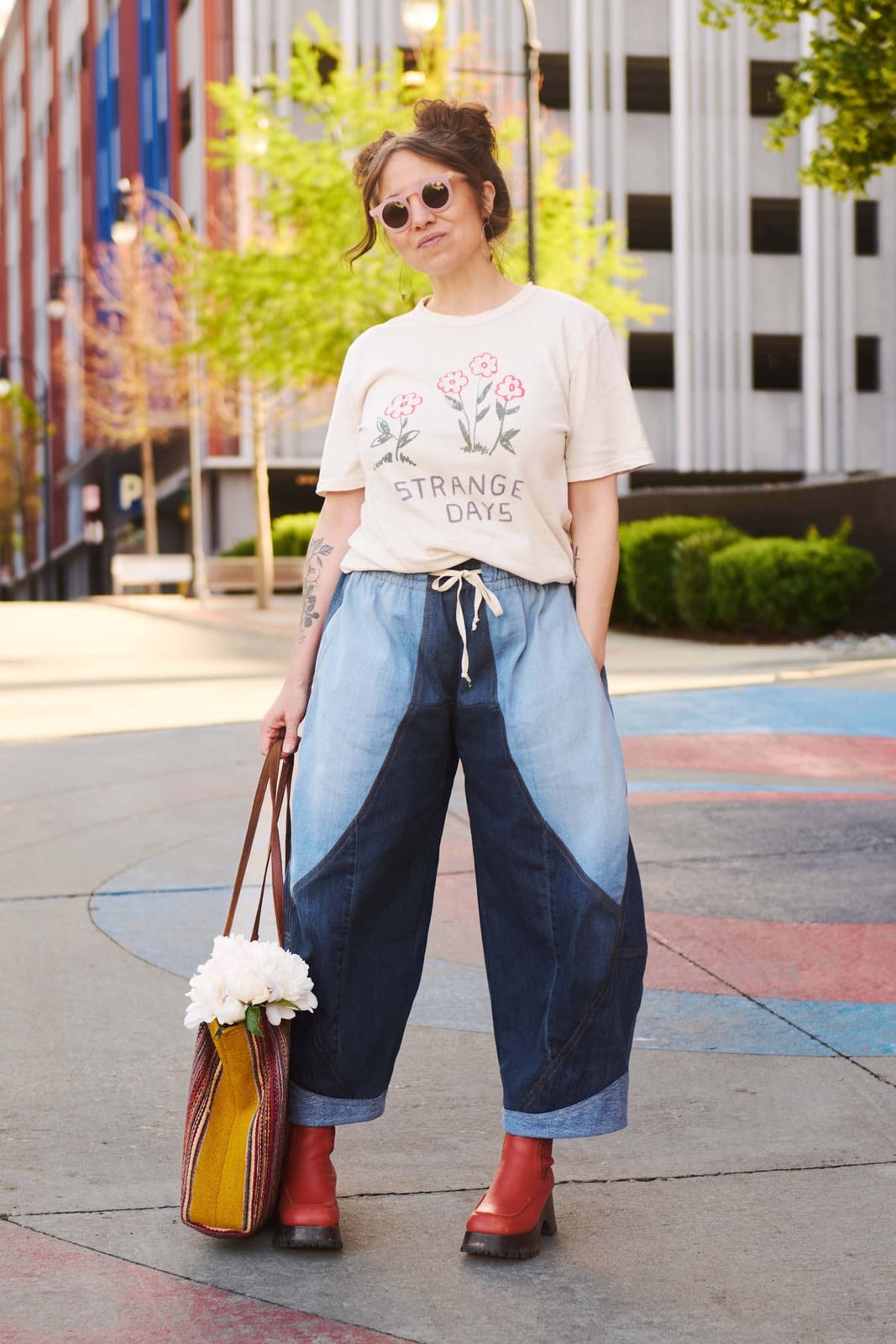 Graphic T-Shirt with Patchwork Denim Pants — Simple Game Day Outfits