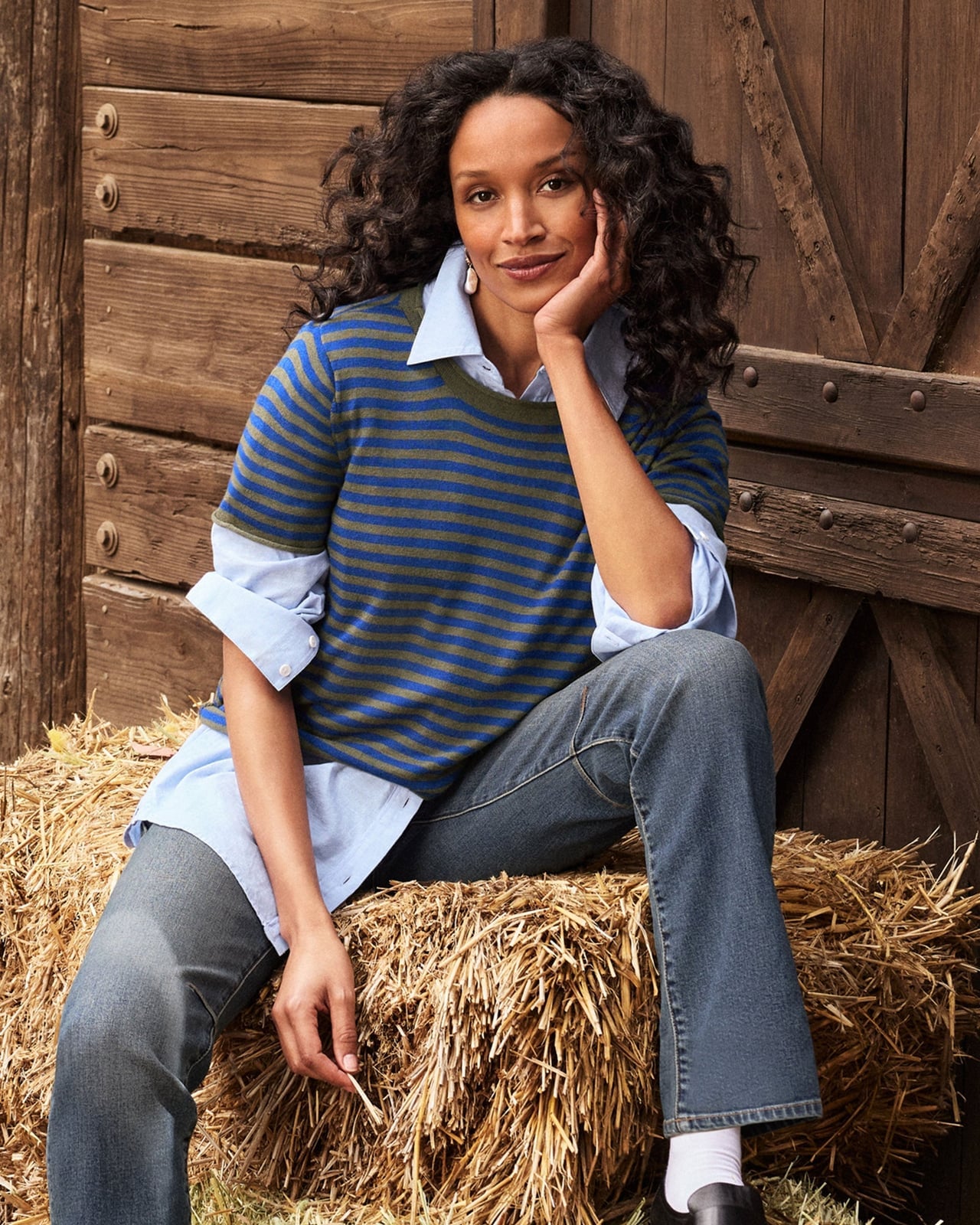 Striped Sweater Over Blue Shirt with Jeans — Simple Game Day Outfits