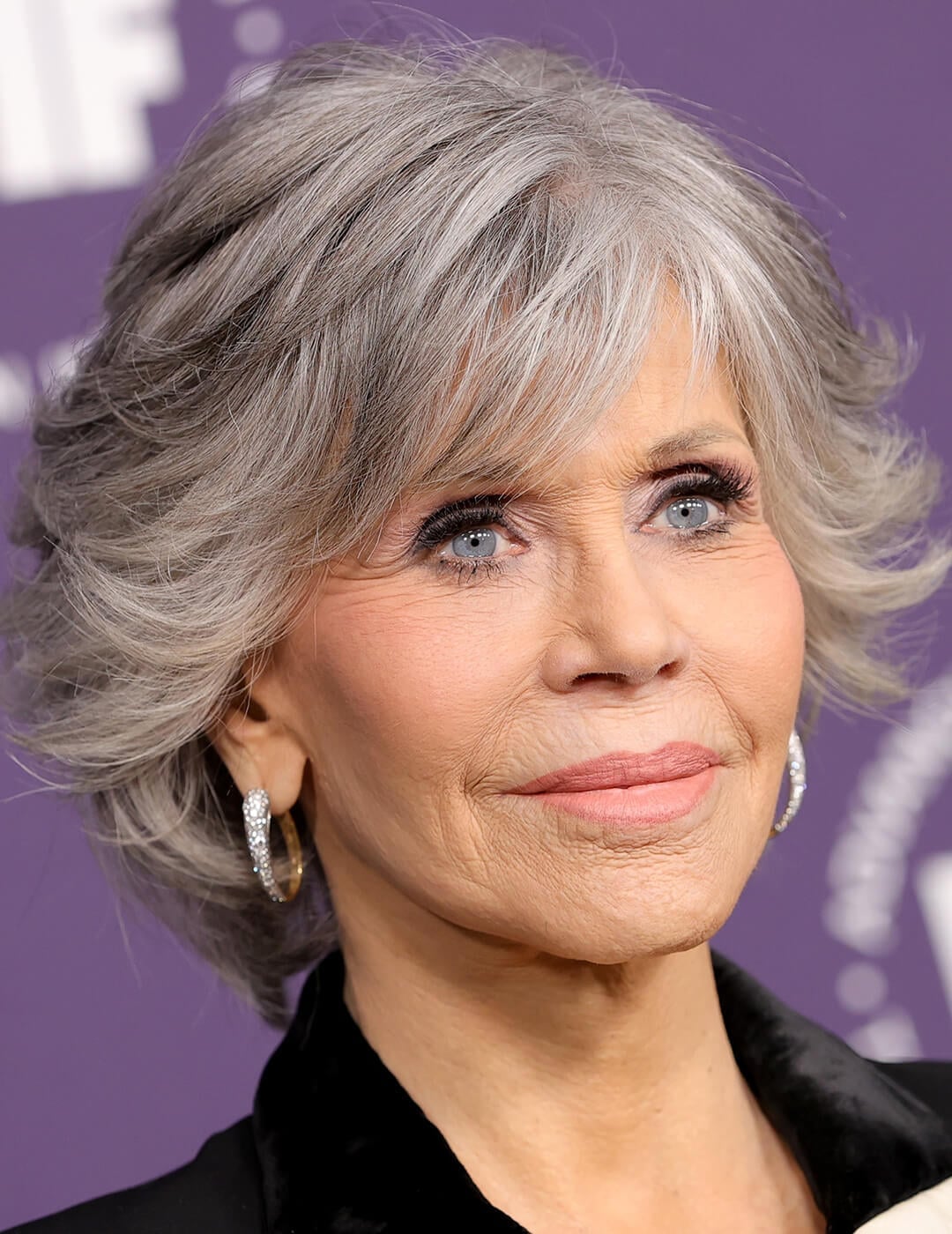 Chin Length Silver Gray Bob With Curtain Bangs Chin Length Silver Gray Bob With Curtain Bangs — Simple Gray Blending