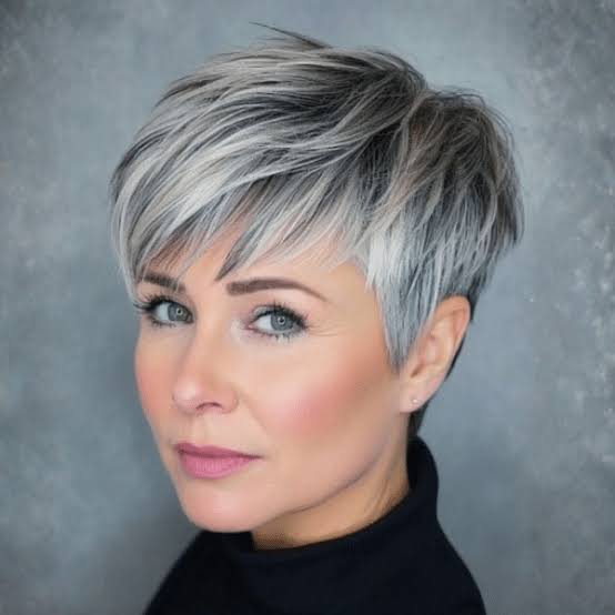 Textured Gray Pixie With Side Swept Bangs Textured Gray Pixie With Side Swept Bangs — Simple Gray Blending