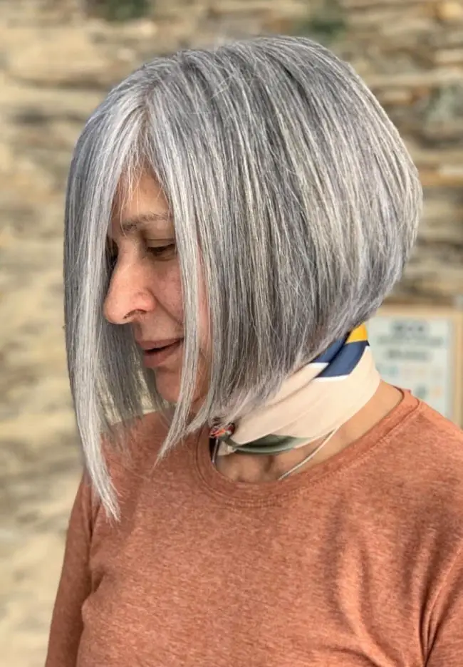 Angled Bob With Soft Face-Framing Layers Angled Bob With Soft Face-Framing Layers — Simple Gray Blending Hair