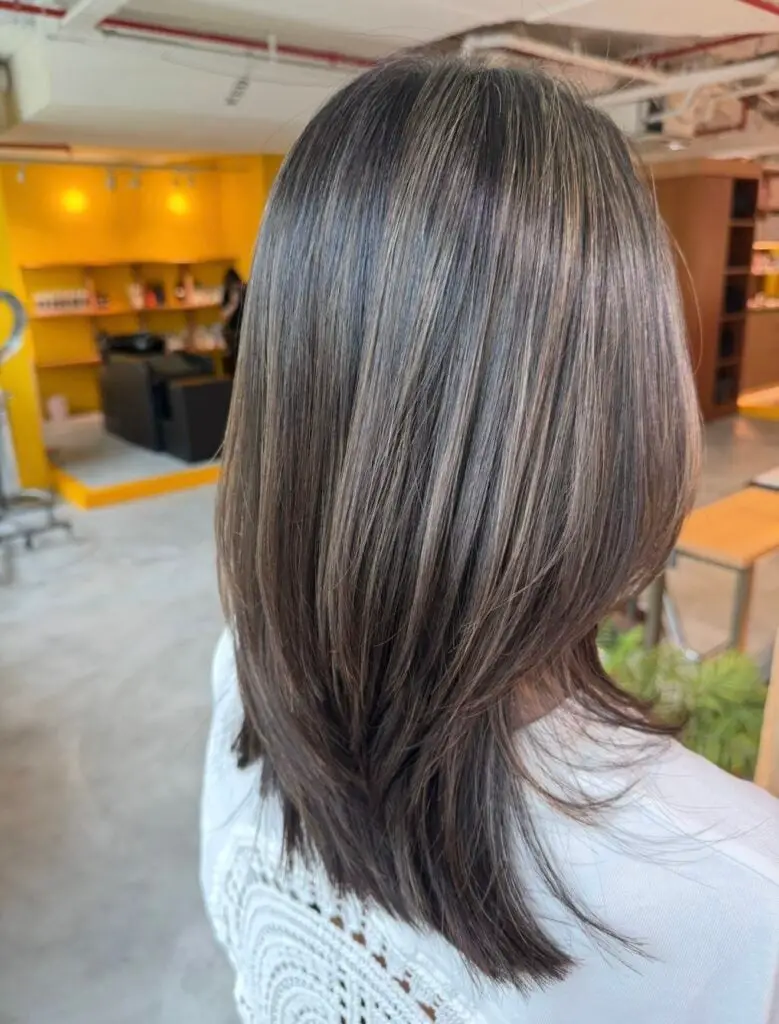 Shoulder Length Bob With Highlight Dimension Shoulder Length Bob With Highlight Dimension — Simple Gray Blending Hair