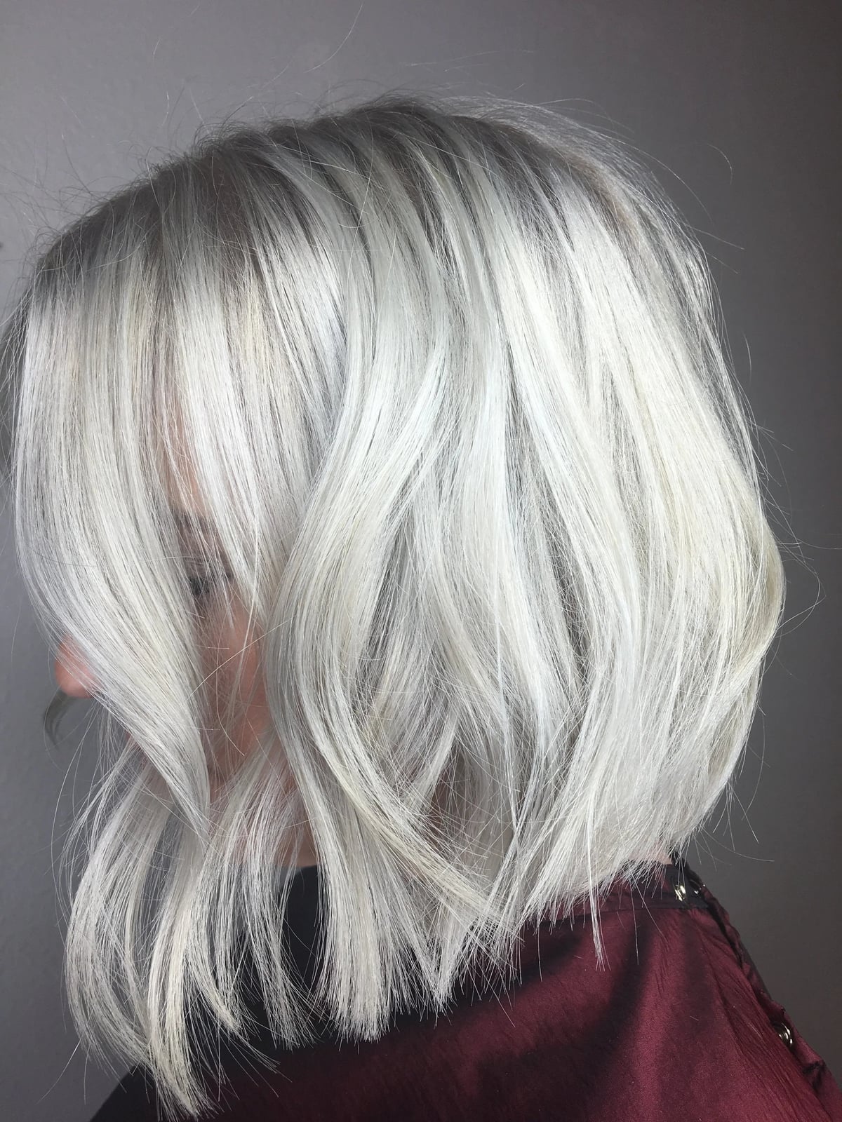 Chin Length Bob in Uniform Ash Blonde Gray Chin Length Bob in Uniform Ash Blonde Gray — Simple Gray Blending Hair