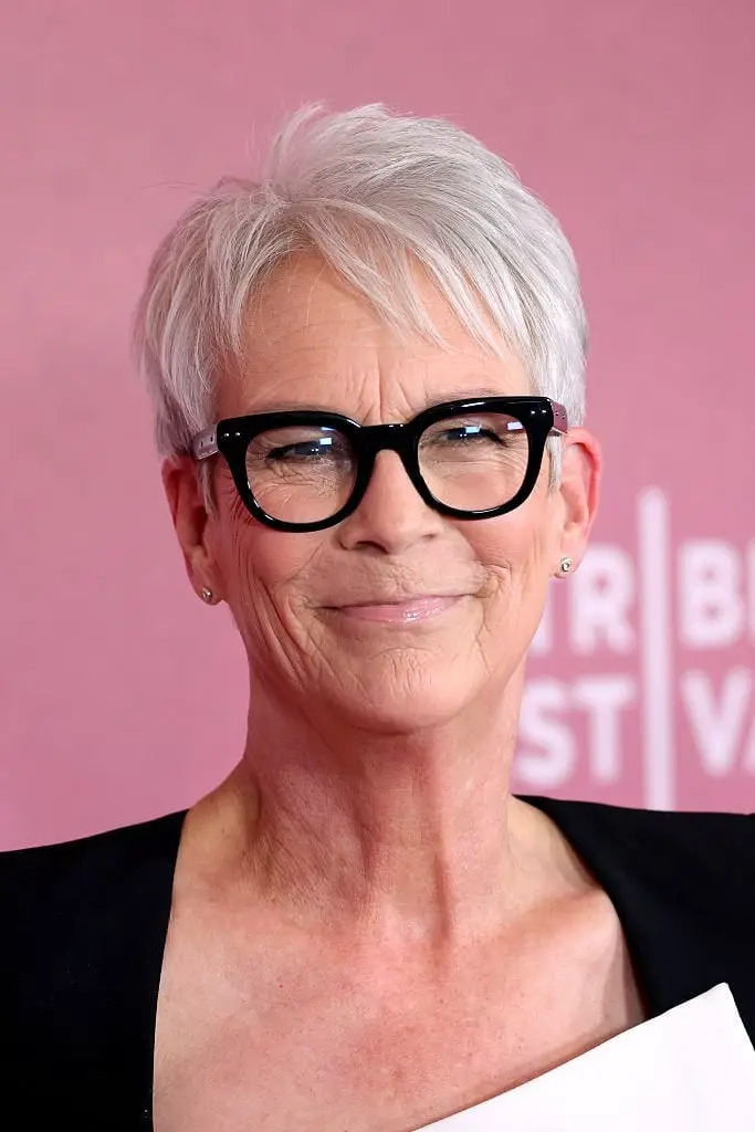 Textured Gray Pixie With Swept Bangs, A Woman With A Short Textured Gray Pixie With Swept Bangs, A Woman With A Short — Simple Gray Hair