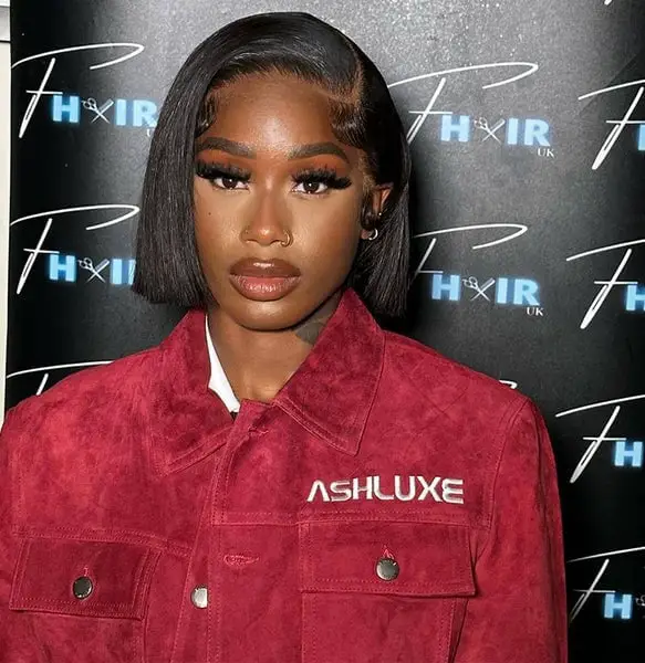 Chin-Length Bob With Blunt Bangs and A Woman With Fine — Simple Haircuts for Black Women