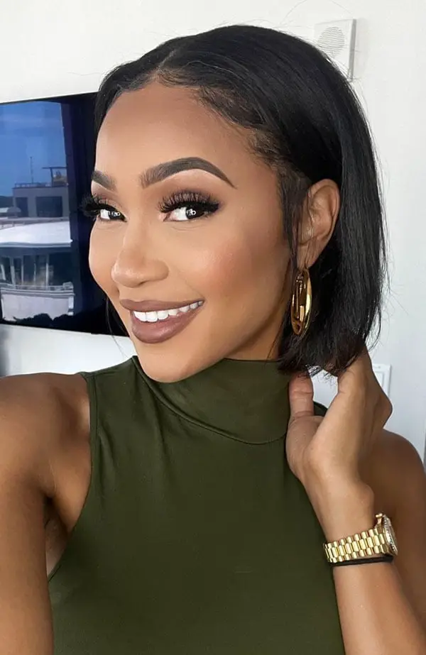 Sleek Chin-Length Bob With Side Parting and A Glossy Finish — Simple Haircuts for Black Women