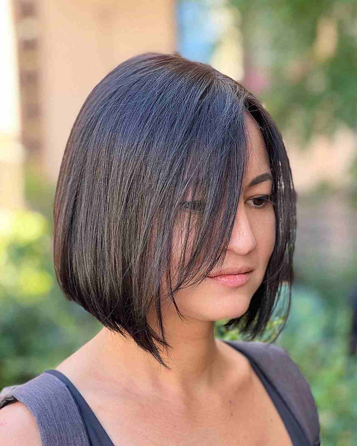Sleek Dark Bob With Face Framing Layers Sleek Dark Bob With Face Framing Layers — Simple Haircuts for Thin Hair