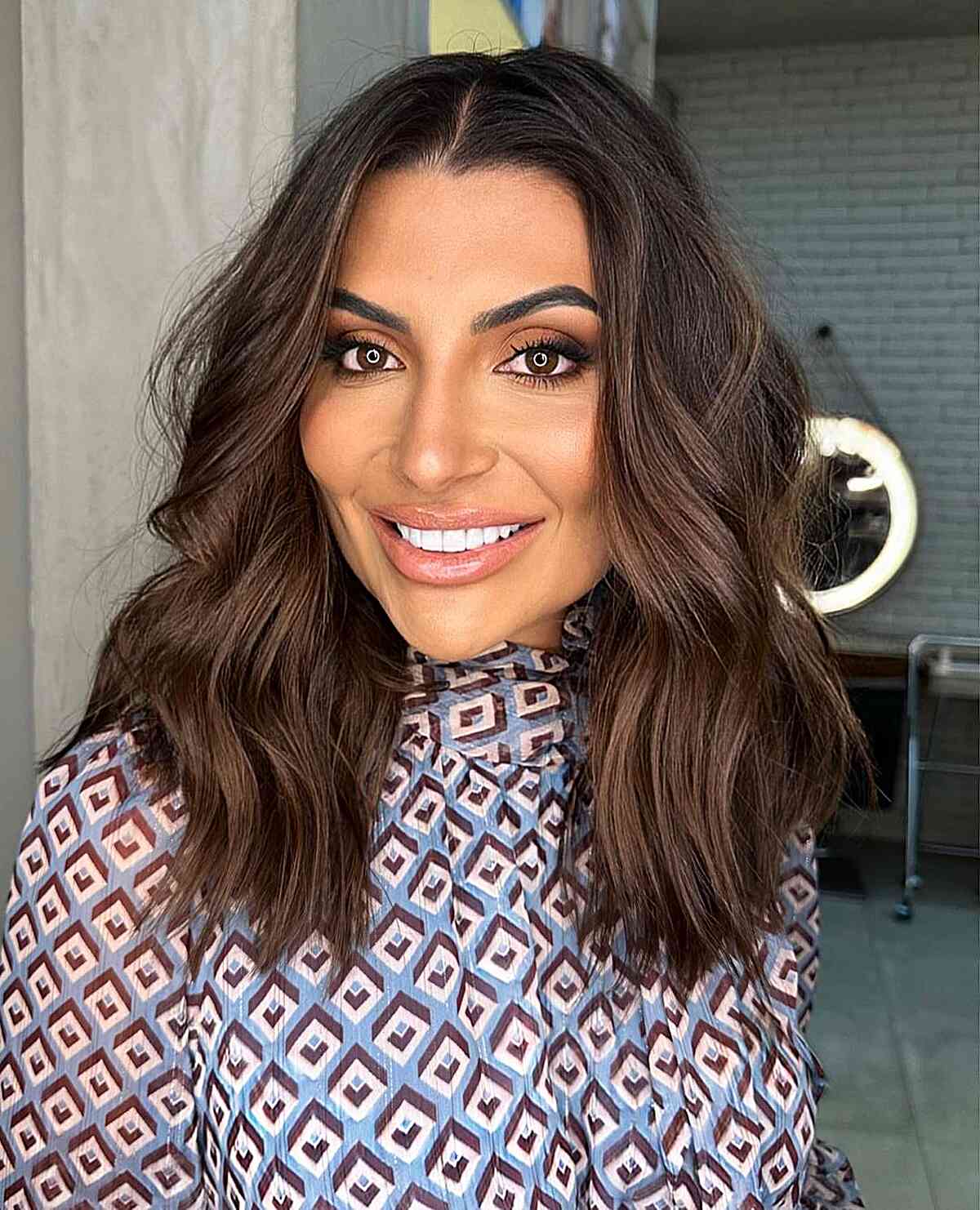 Collarbone Lob With Soft Waves and Dark Brown With Subtle Highlights Collarbone Lob With Soft Waves and Dark Brown With Subtle Highlights — Simple Haircuts for Wavy Hair