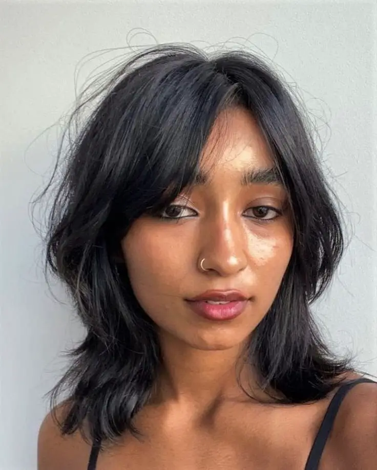 Collarbone Shag With Curtain Bangs Collarbone Shag With Curtain Bangs — Simple Haircuts for Wavy Hair